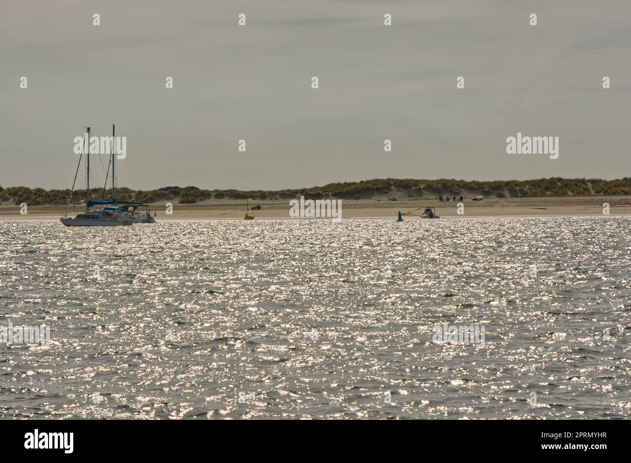 Moored boats at East Head, West Wittering in Chichester Harbour, West