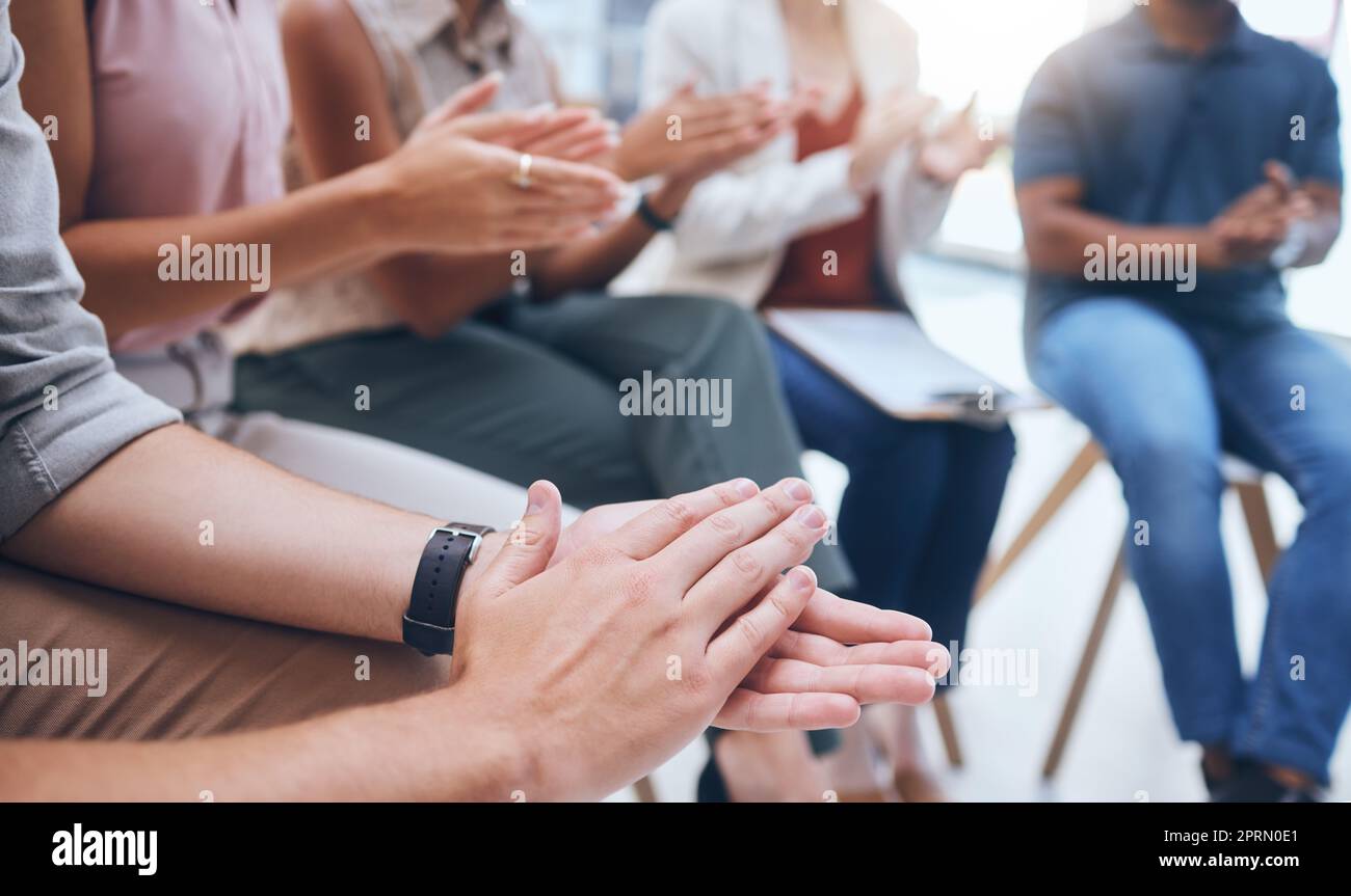 Hand clap, audience row and corporate workshop at tradeshow or seminar pitch with coworkers. Gratitude, thank you or friendly welcome gesture from crowd at business meeting with applause. Stock Photo