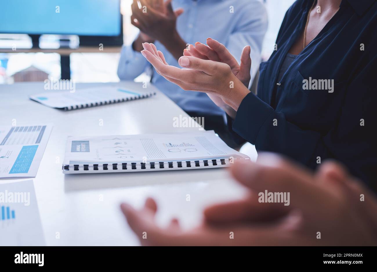 Clapping, teamwork training and workshop in presentation, business conference or office tradeshow. Zoom on diversity hands, motivation or people success for innovation or company education with paper Stock Photo