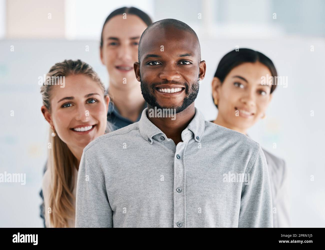 Black man leader, teamwork portrait and collaboration, company vision and happy staff. Business people group, diversity workers and smile professional standing in unity, motivation and leader support Stock Photo