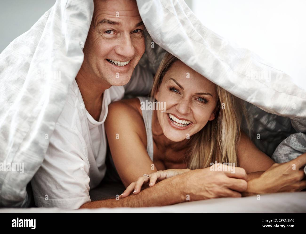 We dont need an excuse to spend all day in bed. an affectionate couple