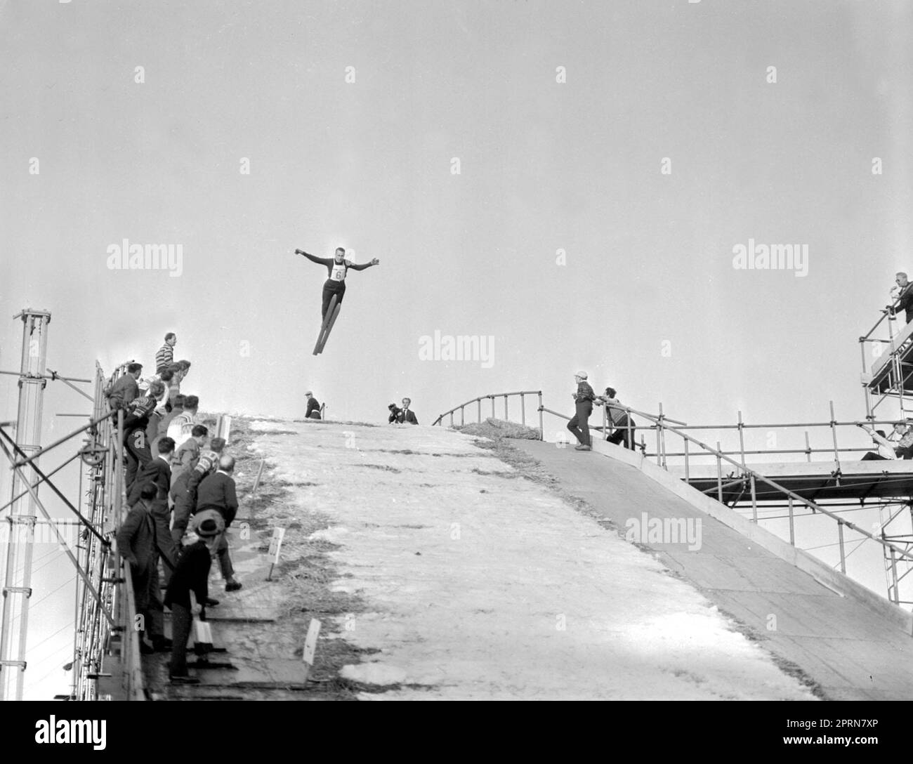 File photo dated 31-05-1961 of Harry Bergqvist, 28-year-old insurance agent and national champion of Sweden, flies without wings. He's taking off from the ski jump 150 feet high that's been built at Wembley Stadium, London, for the Internationbal Ski Jumping and Winter Sports Exhibition. Harry comes from Sundsvall, Sweden. Wembley was not just a football venue. Here, Harry Bergqvist, a 28-year-old insurance agent and national champion of Sweden, took on a 150-foot high ski jump built for the International Ski Jumping and Winter Sports Exhibition in May 1961. Issue date: Thursday April 27, 2023 Stock Photo