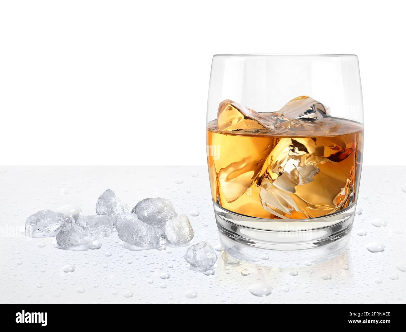 glass of bourbon whisky with ice on the rocks Stock Photo - Alamy