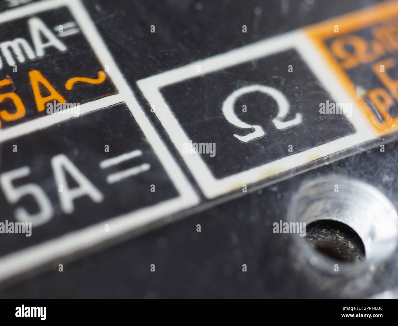 electrical symbols on a vintage analog multimeter measuring instrument