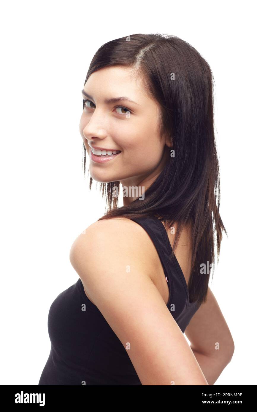 Hey there...A pretty young woman woman looking over her shoulder at you