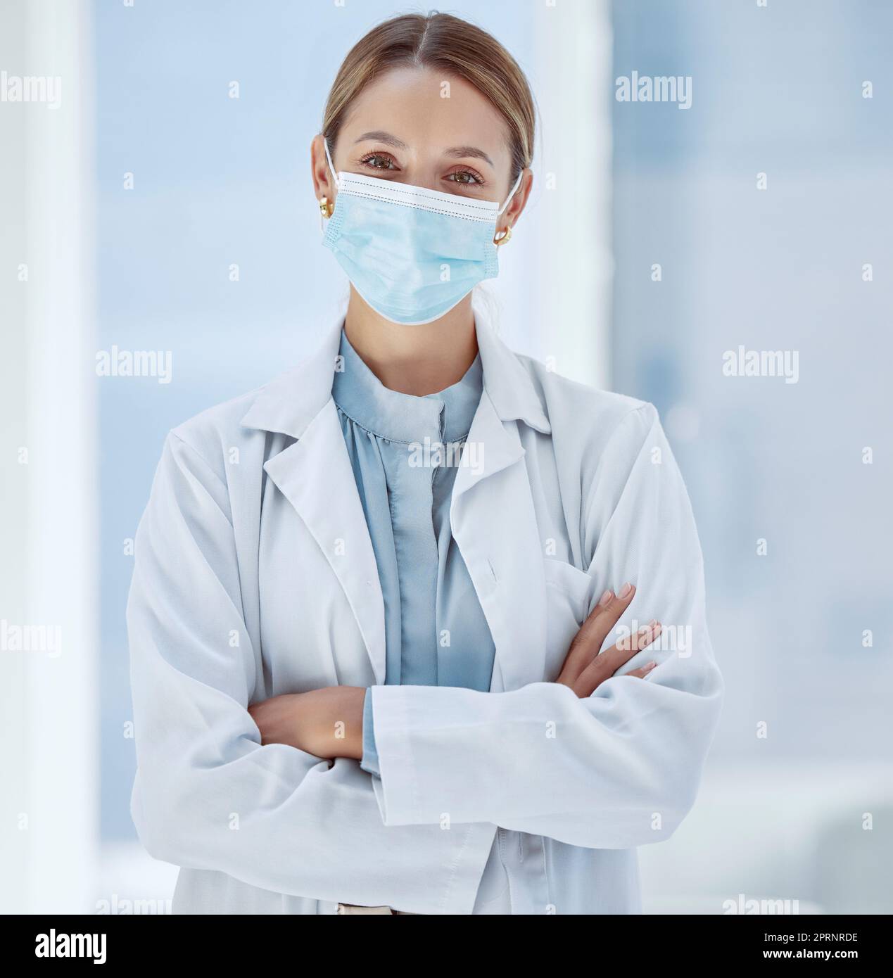 Woman, healthcare and covid face, mask rules with proud doctor working