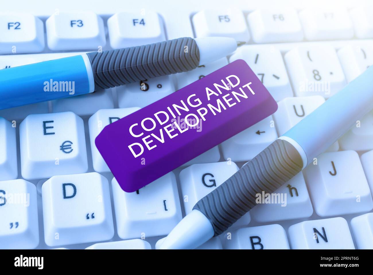 Handwriting text Coding And Development, Word Written on Programming Building simple assembly Programs Stock Photo