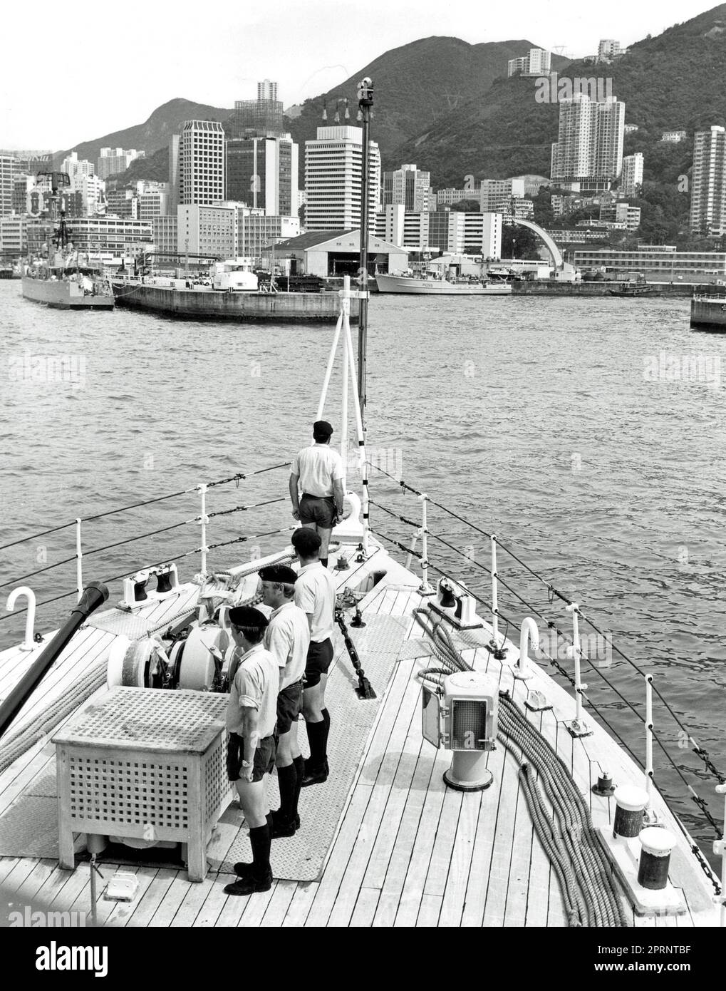 A Ton-class patrol craft of the Royal Navy's Hong Kong Squadron entering the basin at HMS Tamar, RN shore base in Hong Kong, after a patrol in 1976. Stock Photo