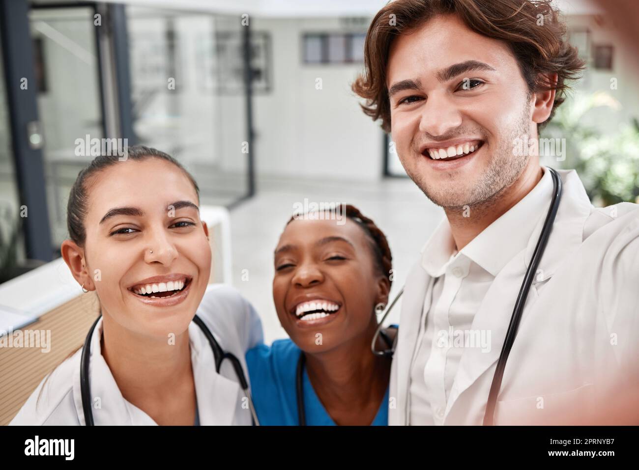 Healthcare, hospital and doctors taking selfie, bonding while working