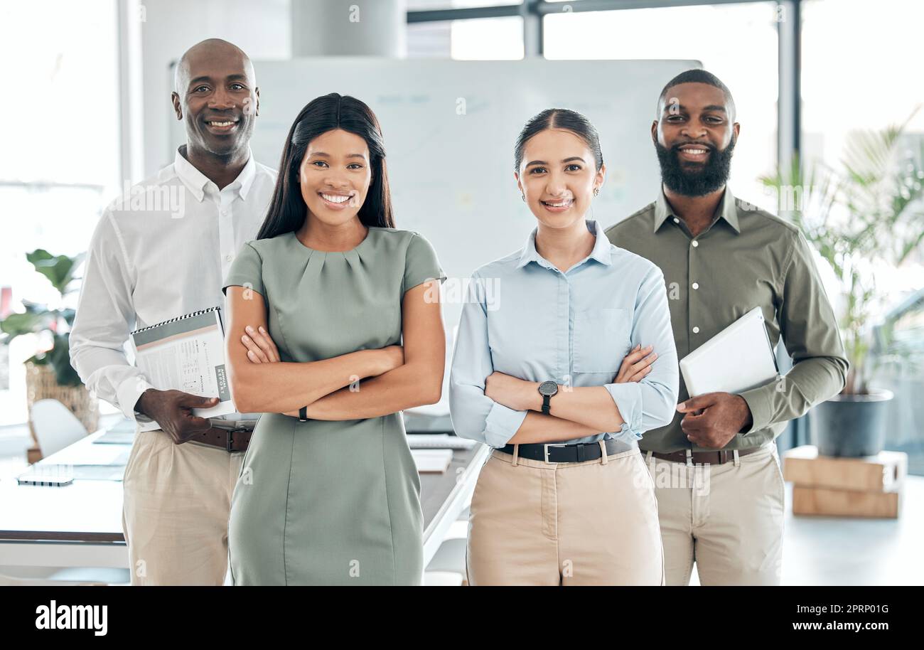 Team, leadership and diversity portrait of motivation with happy business people with arms crossed in office. Women and black men working together for collaboration, innovation and vision for success Stock Photo