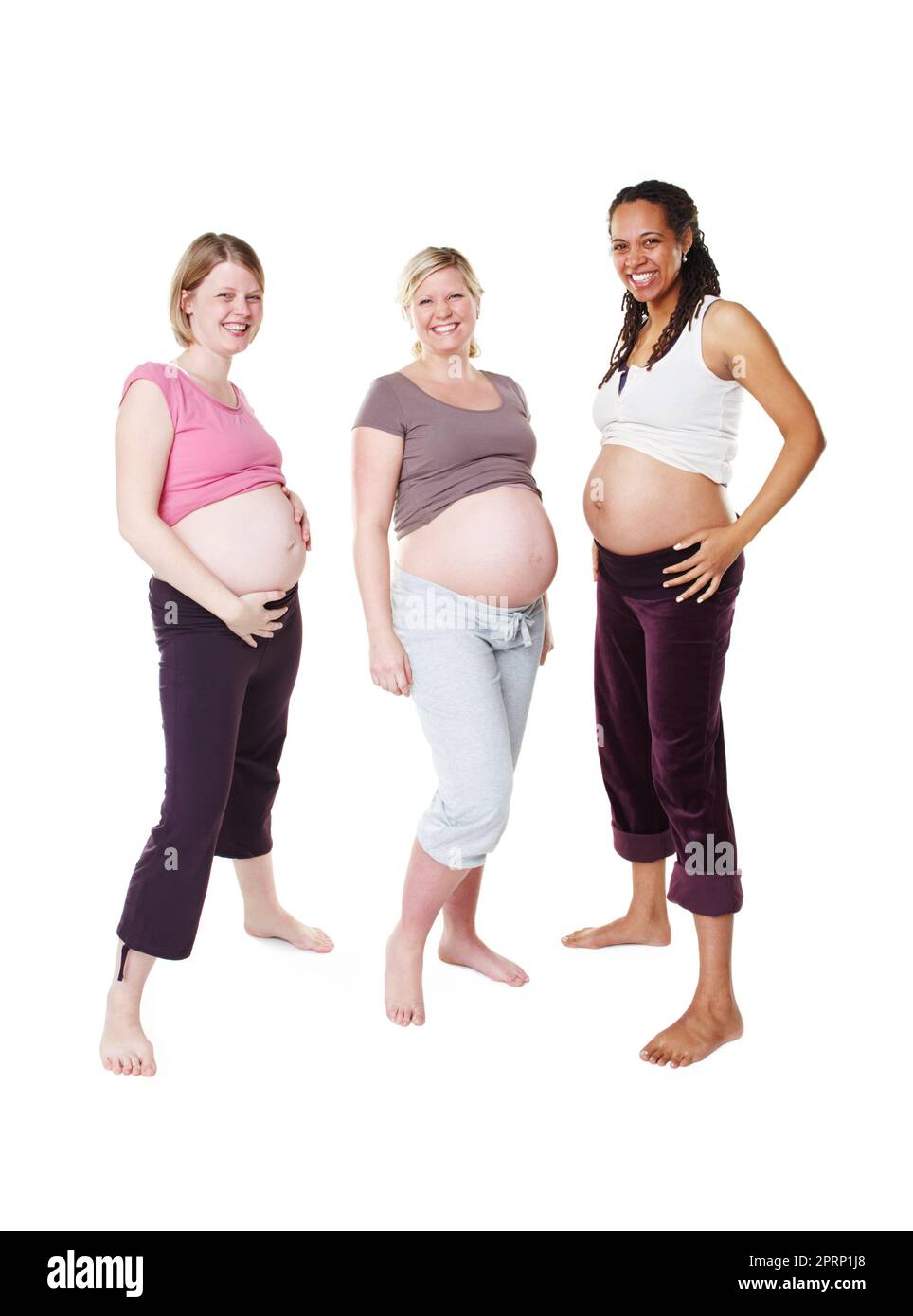 Portrait of happy pregnant, woman and friends in a group photo over white studio background. Female people in diversity smile with baby bumps or belly standing in happiness to be a mother in mockup. Stock Photo