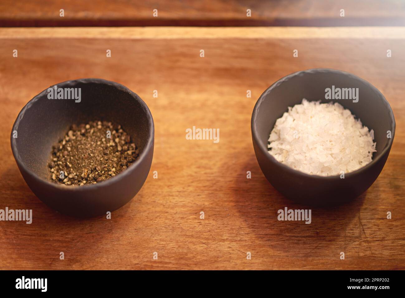 https://c8.alamy.com/comp/2PRP202/salt-and-pepperits-always-better-when-were-together-salt-and-pepper-in-bowls-on-a-tabletop-2PRP202.jpg