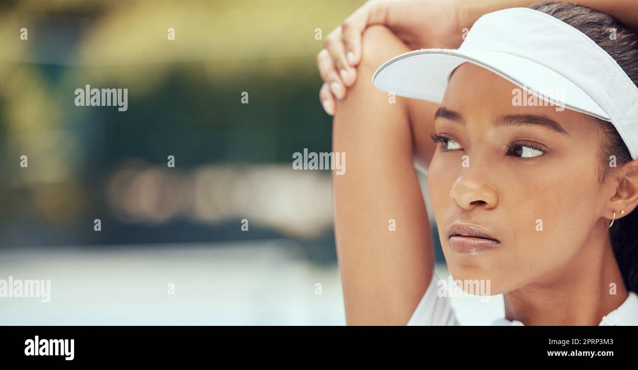 Black woman athlete, stretching muscle and exercise focus training wellness. Strong fitness ambition, sports workout motivation and young healthy girl with flexible arm joints closeup portrait Stock Photo