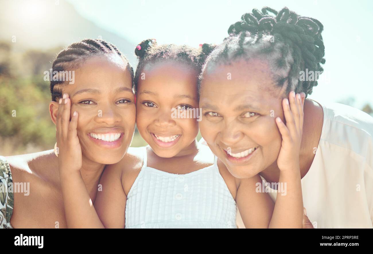 Face portrait, grandmother or mother and daughter with a smile on holiday, vacation or trip. Happy black family, ancestry or African people together in the beautiful shining sun or sunshine outside. Stock Photo