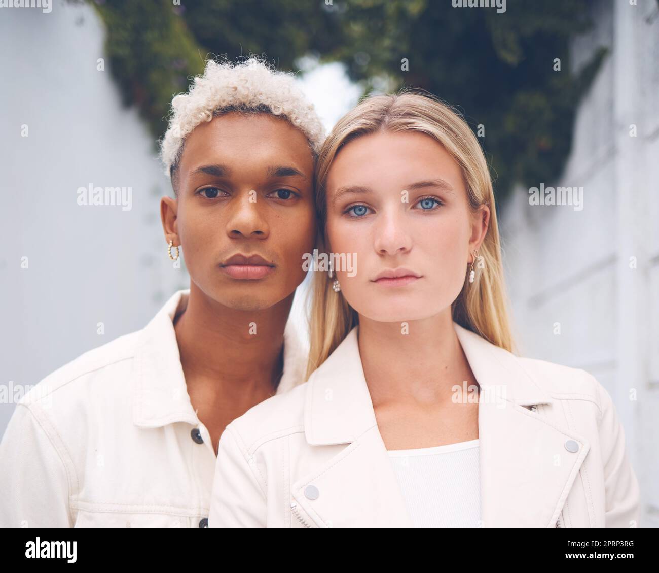 Model designer, love and diversity couple portrait of couple or friends in street style or spring clothing at work. Partnership, influencer and design with beauty, creative and stylish man and woman Stock Photo