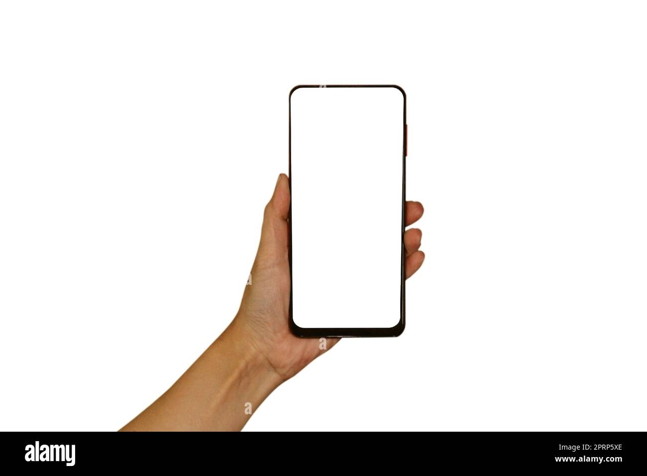 A woman's hand is holding a smartphone. Isolated object on a white background. Stock Photo