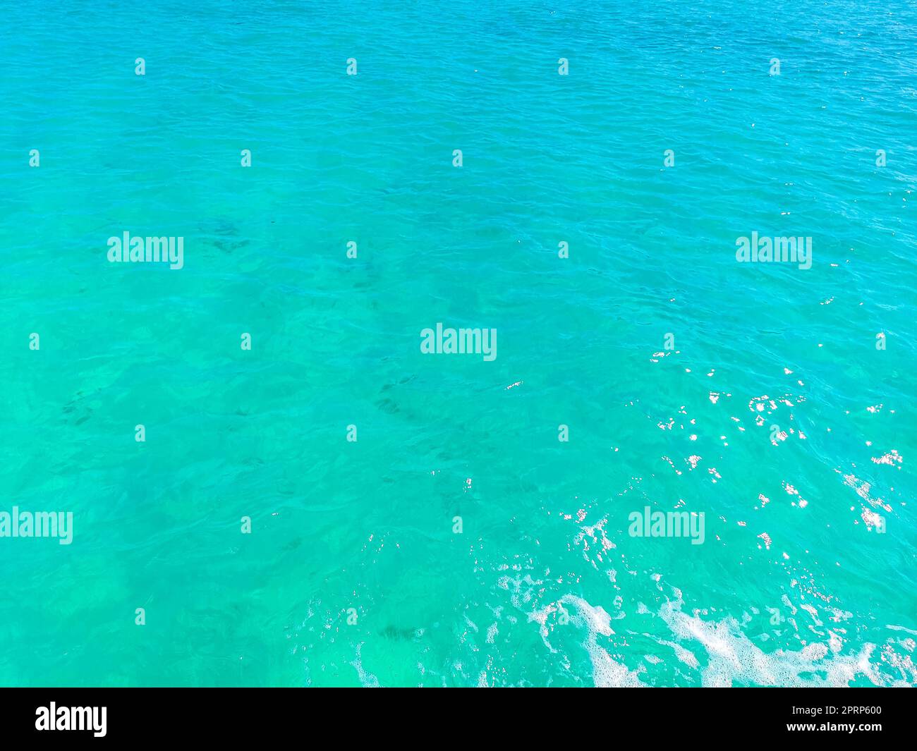 Blue turquoise water waves ocean and sea texture pattern Mexico. Stock Photo