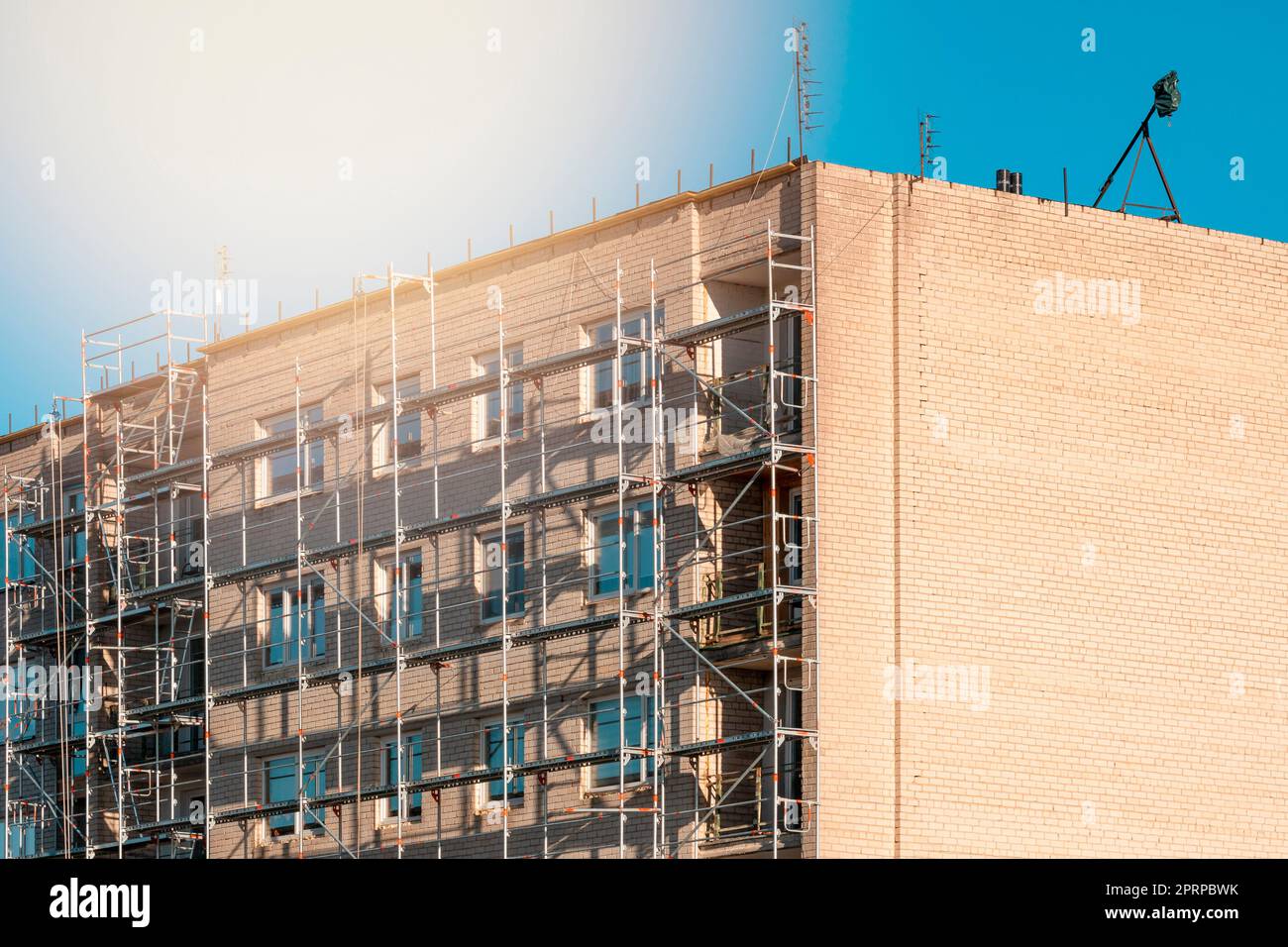 View of Part of construction site with scaffolding on multistory building ...
