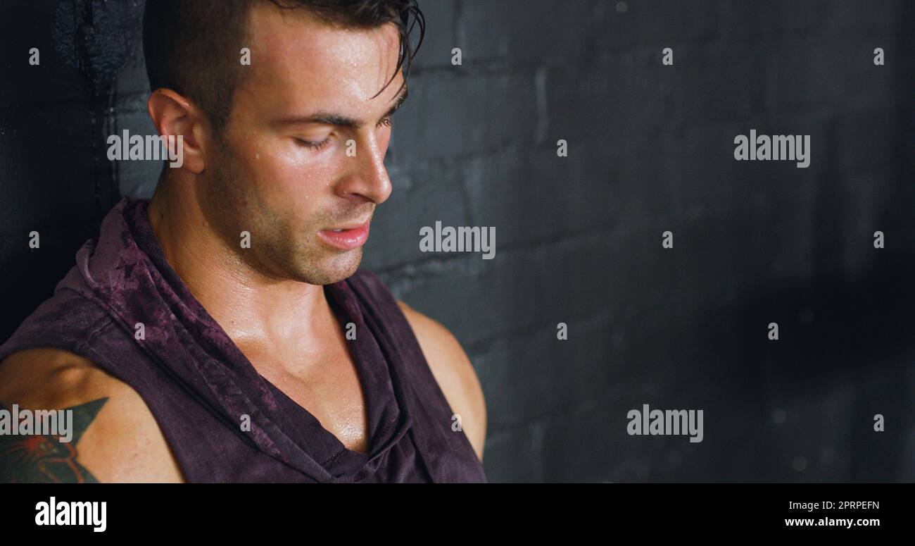 Dont fear failure, fear being average. a young man looking unhappy