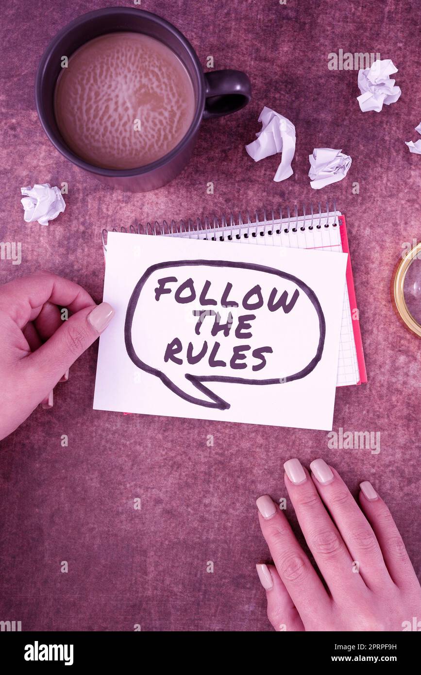 Handwriting text Follow The Rules, Business approach learn to conform the compliance, regulations, or guidelines Hand Of Woman With Thought Bubble Pap Stock Photo