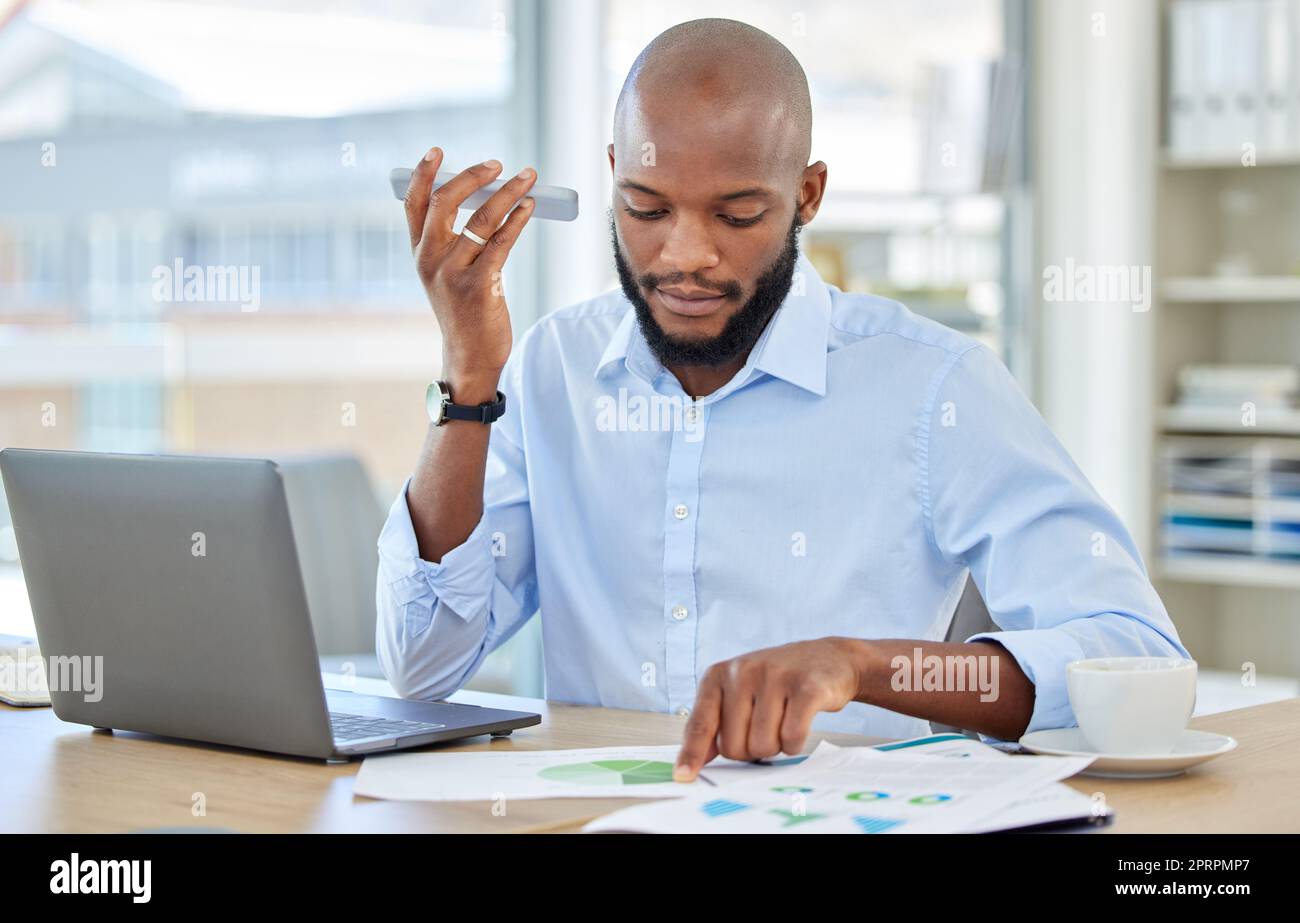 Planning, phone and businessman listening to voice message, note or audio in marketing, chart and strategy. Analytics, documents and graph with young black man working on idea, report or review Stock Photo