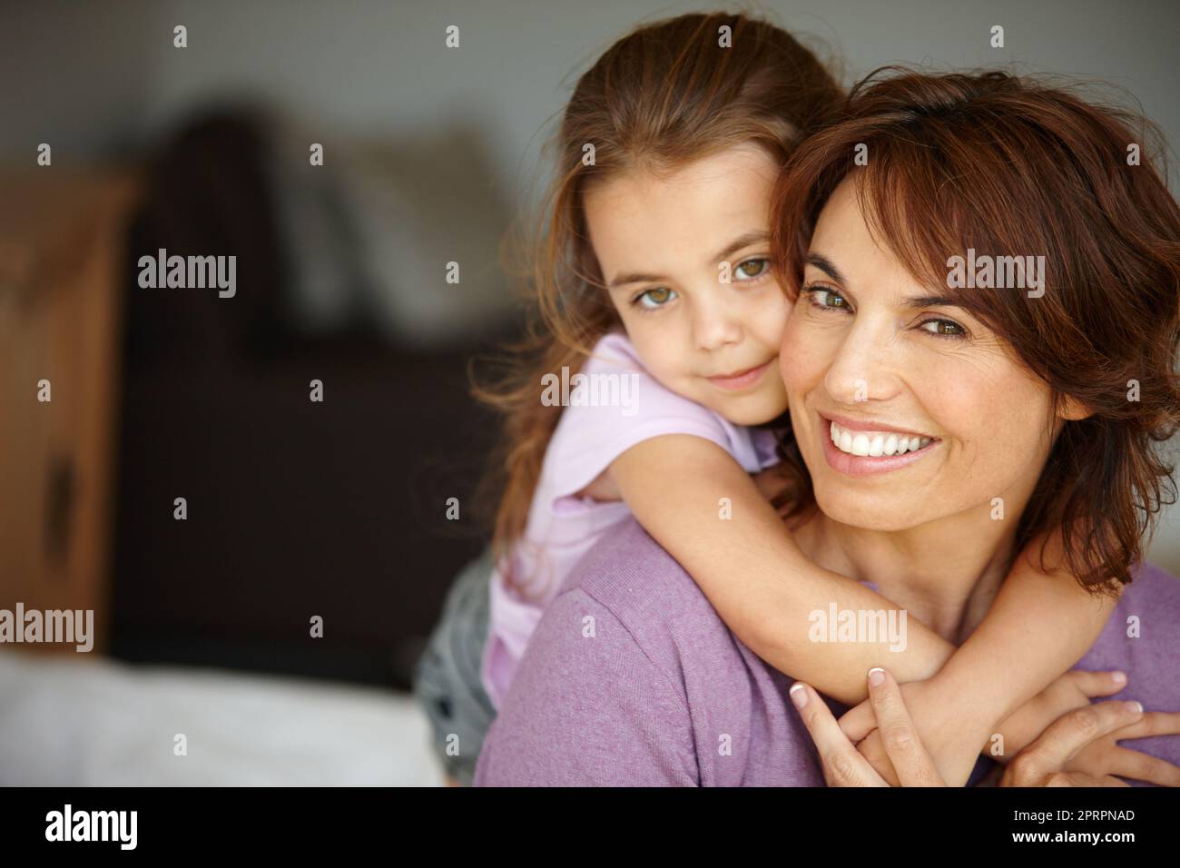 Mom is my best friend. Portrait of a mother spending time with her adorable little girl. Stock Photo