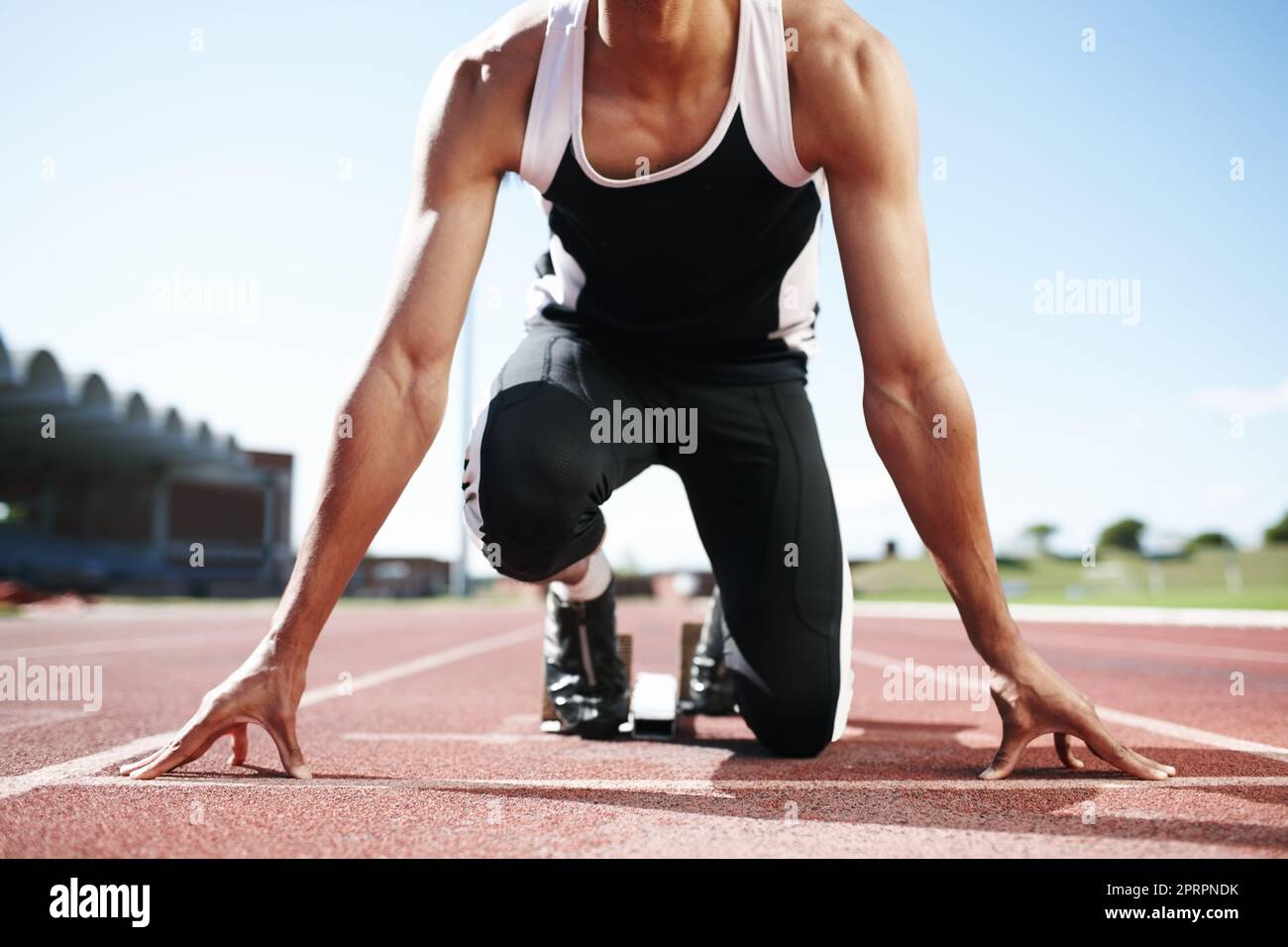 His body is a machine. View of a young runners body at the body. Stock Photo