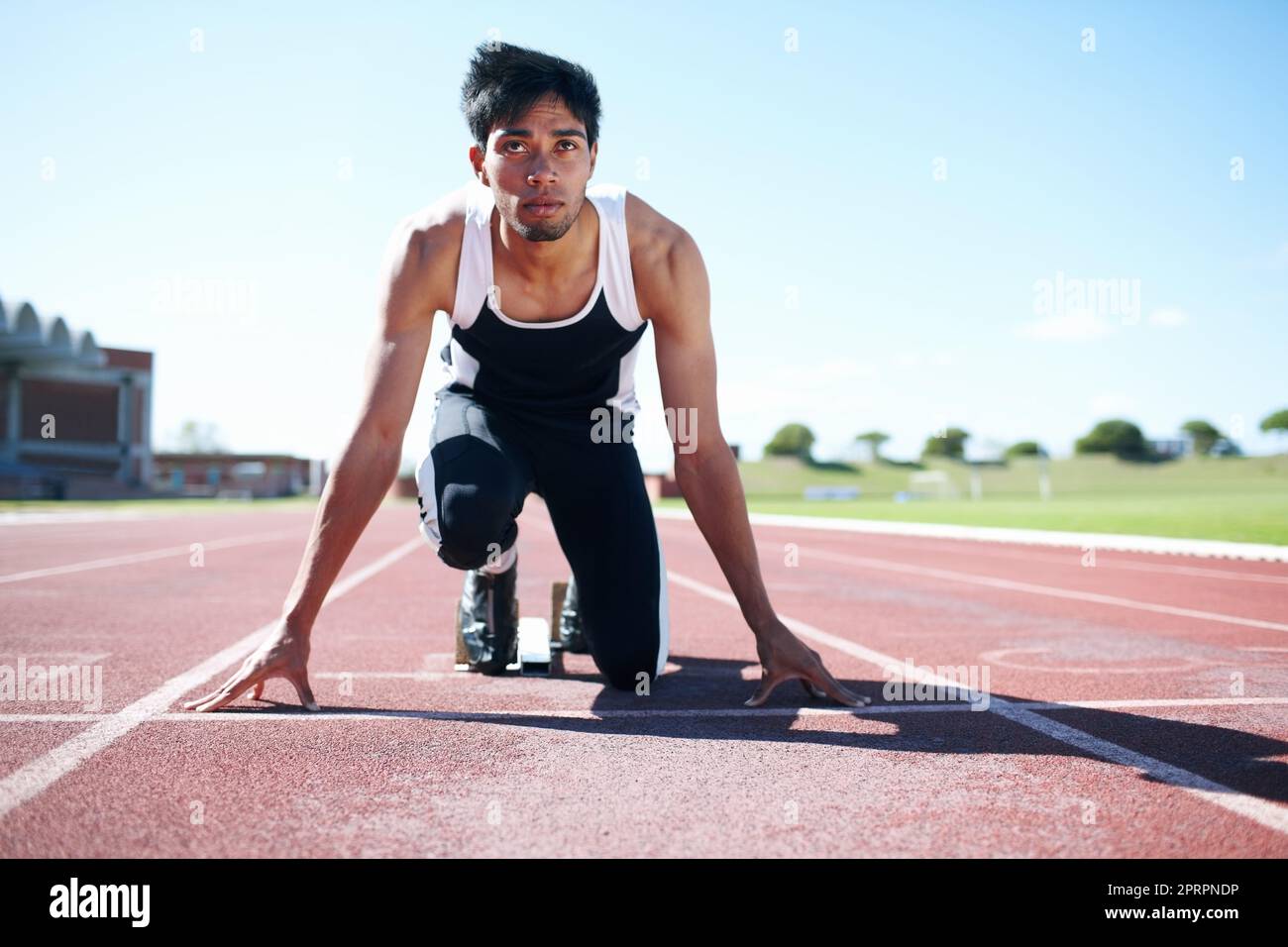 Hes got a one-track mind. A young sprinter focussing on his goals. Stock Photo