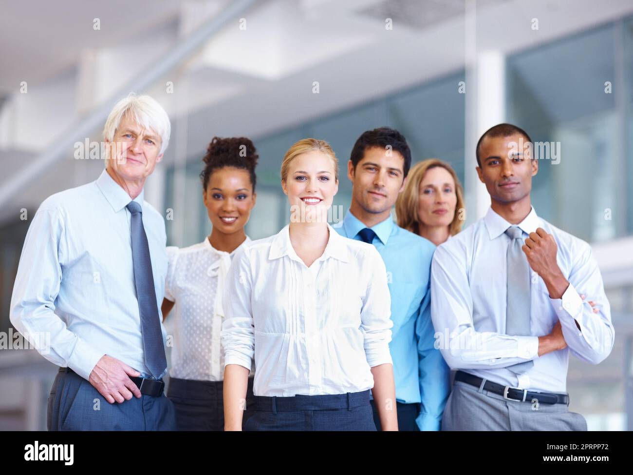 Confident business people. Portrait of confident multi racial business people together at office. Stock Photo