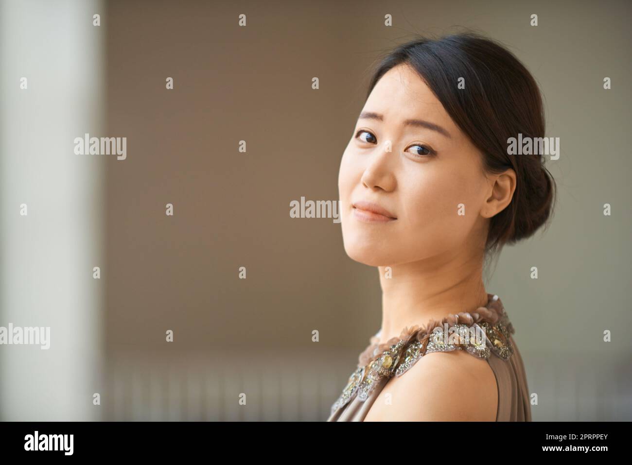 Portrait of perfect elegance. Portrait of an elegantly dressed young woman. Stock Photo