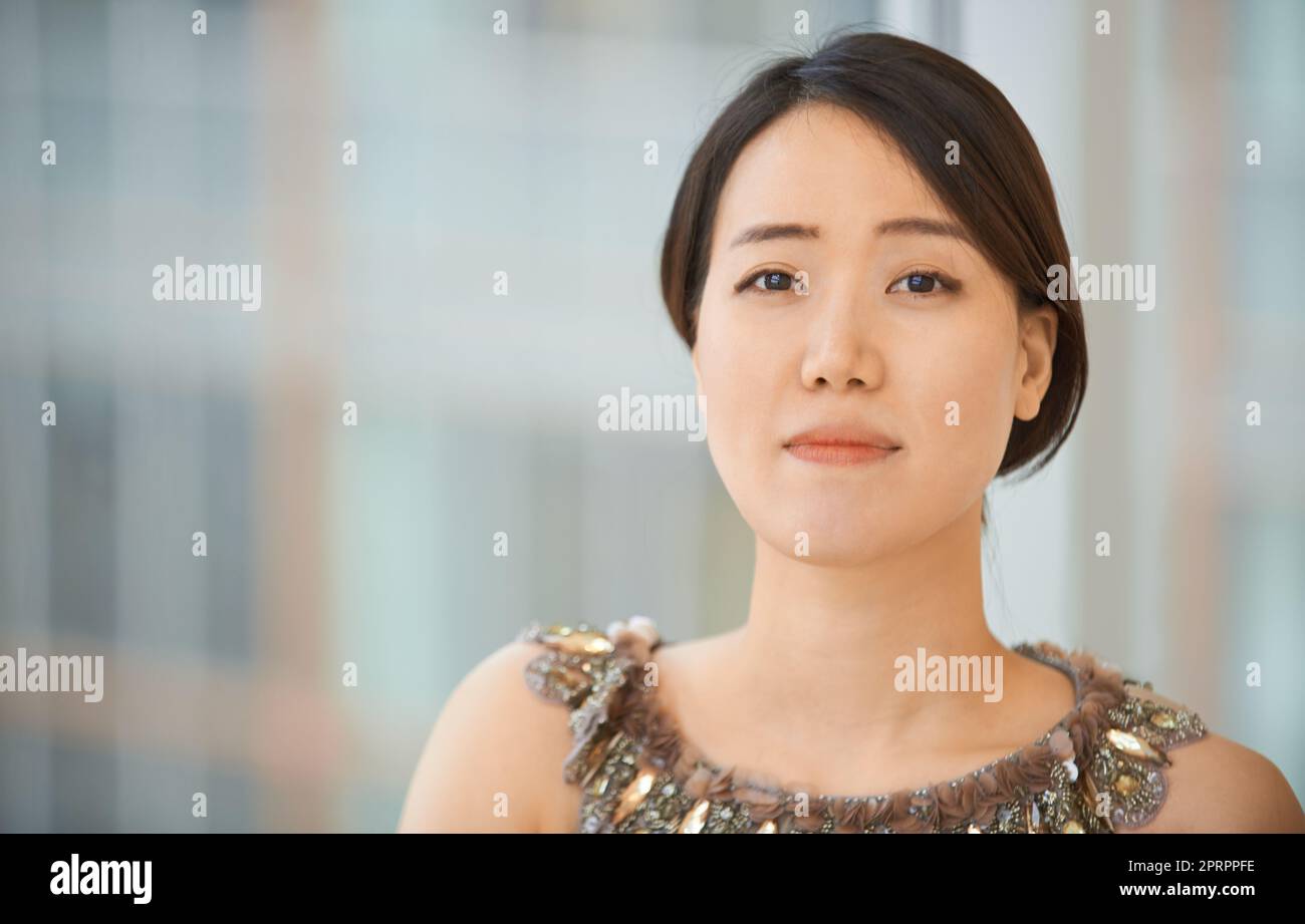 Shes the epitome of grace. Portrait of an elegantly dressed young woman. Stock Photo