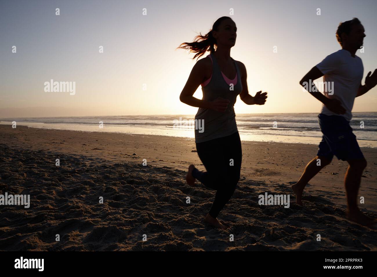 Headed toward a better lifestyle. a young couple exercising outdoors. Stock Photo