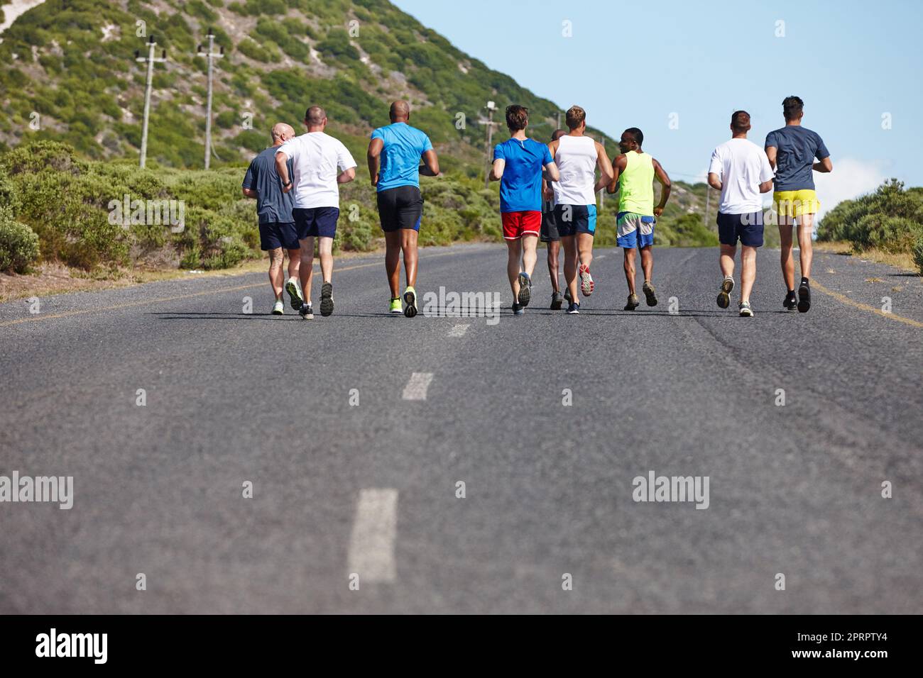The run is more fun with friends rearview shot of a group of men