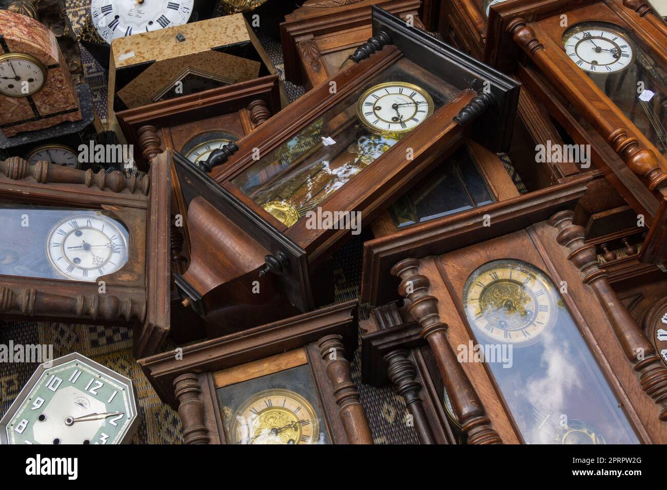 Group of vintage wooden wall clocks lying Stock Photo Alamy