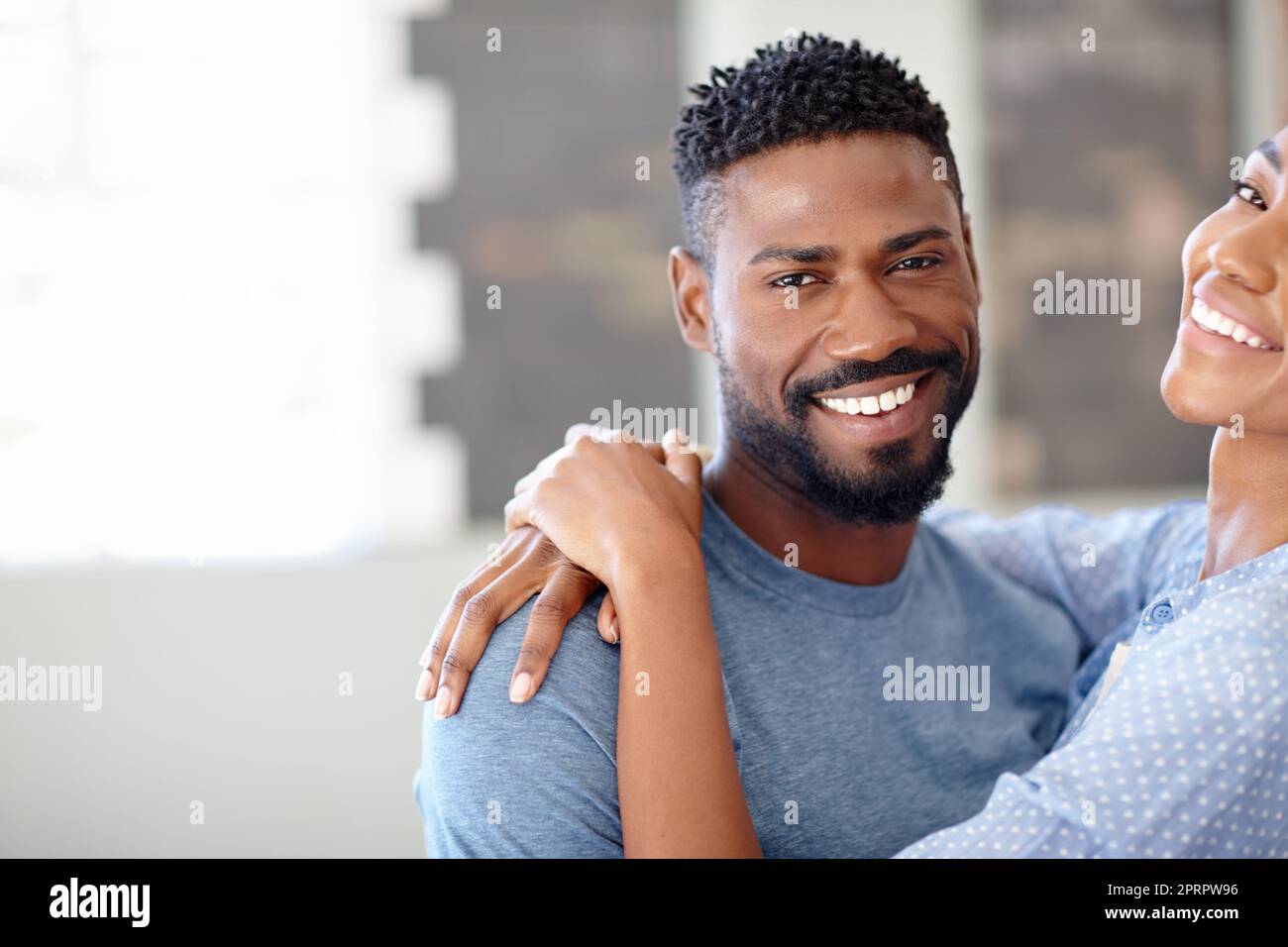 Shes my one and only. a handsome man and an attractive female. Stock Photo