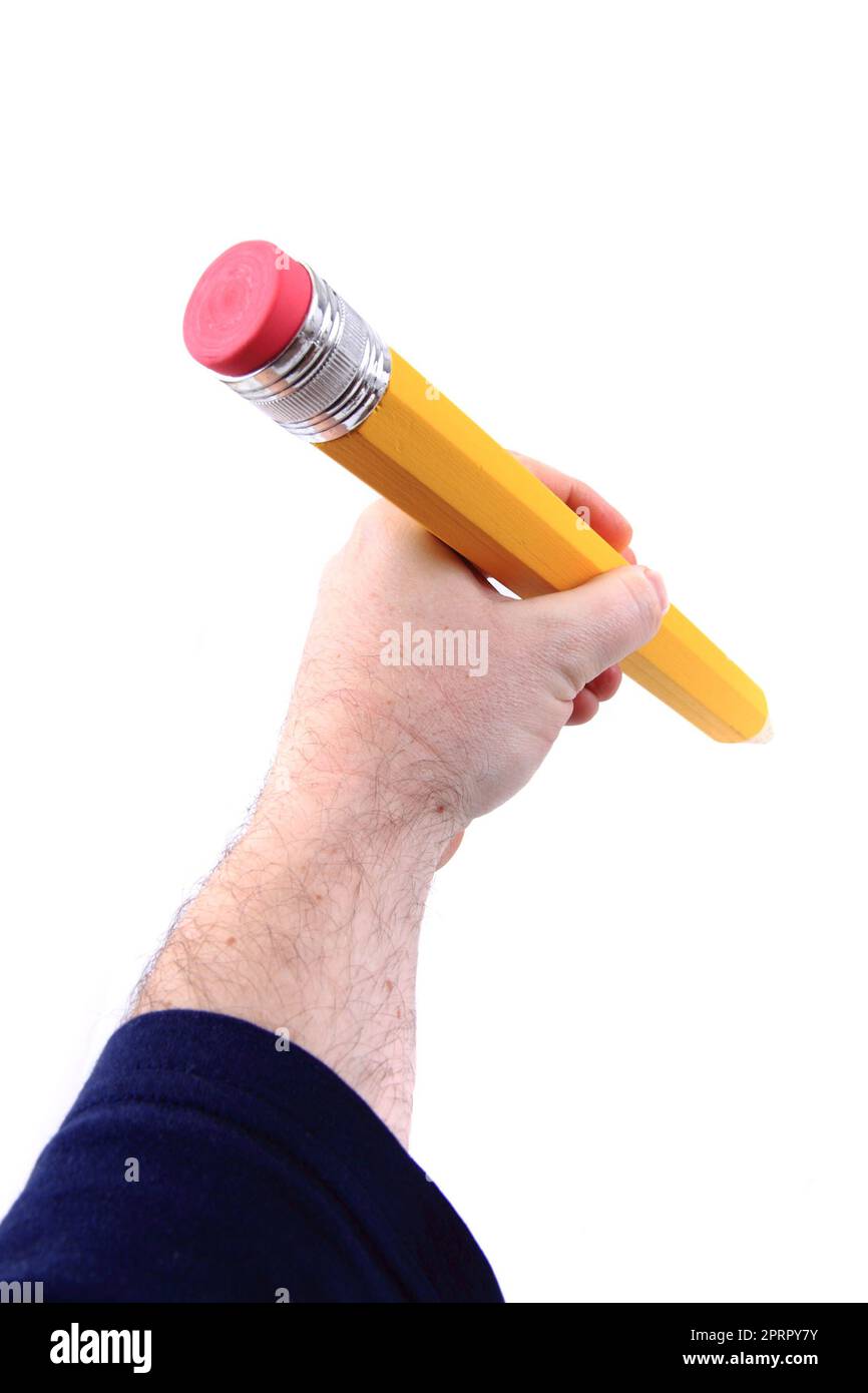 big pencil in human hand isolated on the white background Stock Photo ...