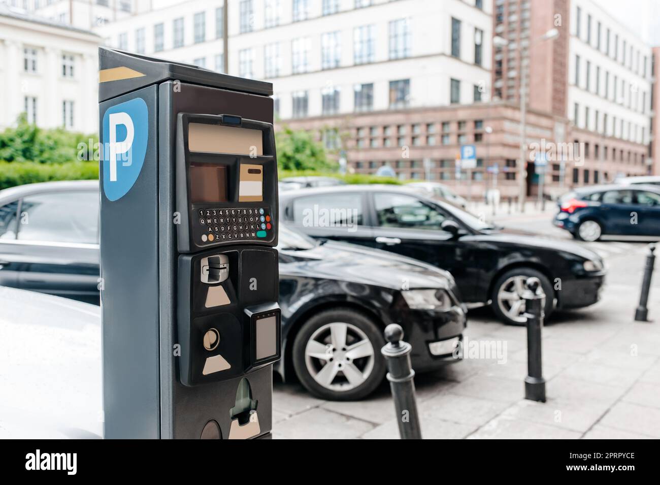 Modern parking meter on city street, space for text Stock Photo Alamy