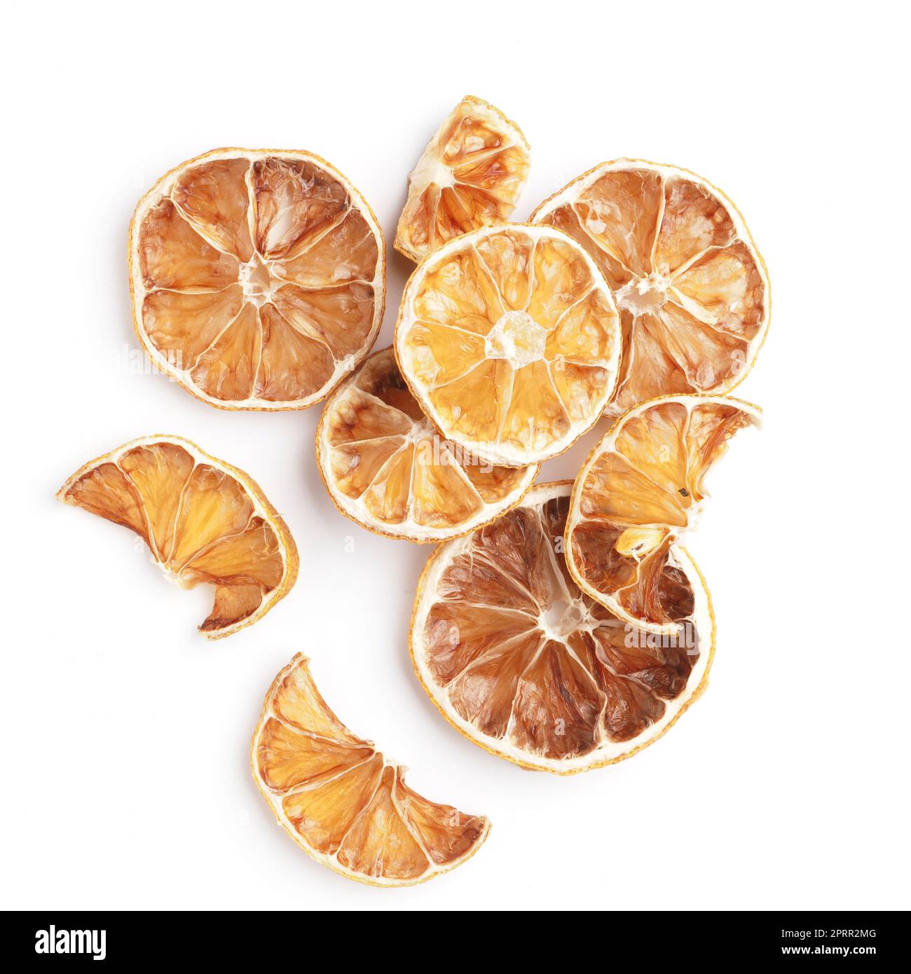 Dried orange fruit slices on a white background Stock Photo