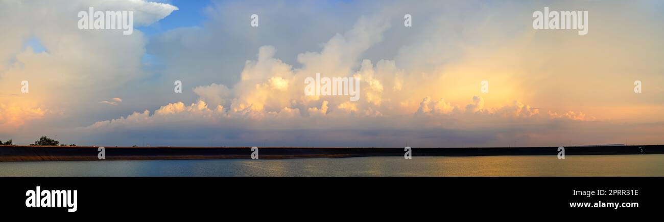 Panorama of Dramatic vibrant color with cloud of sunrise Stock Photo