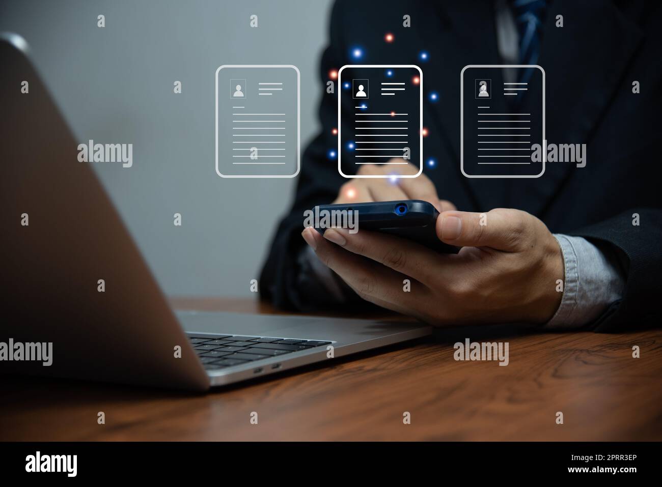 Businessman touching on virtual screen. Enterprise Resource Planning ERP document management concept with icons on the virtual screen. Stock Photo