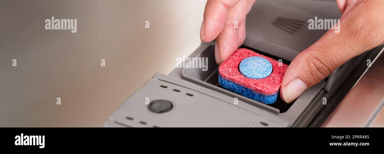 Putting Dishwash Detergent Tablet In Dishwasher Machine Stock Photo Alamy