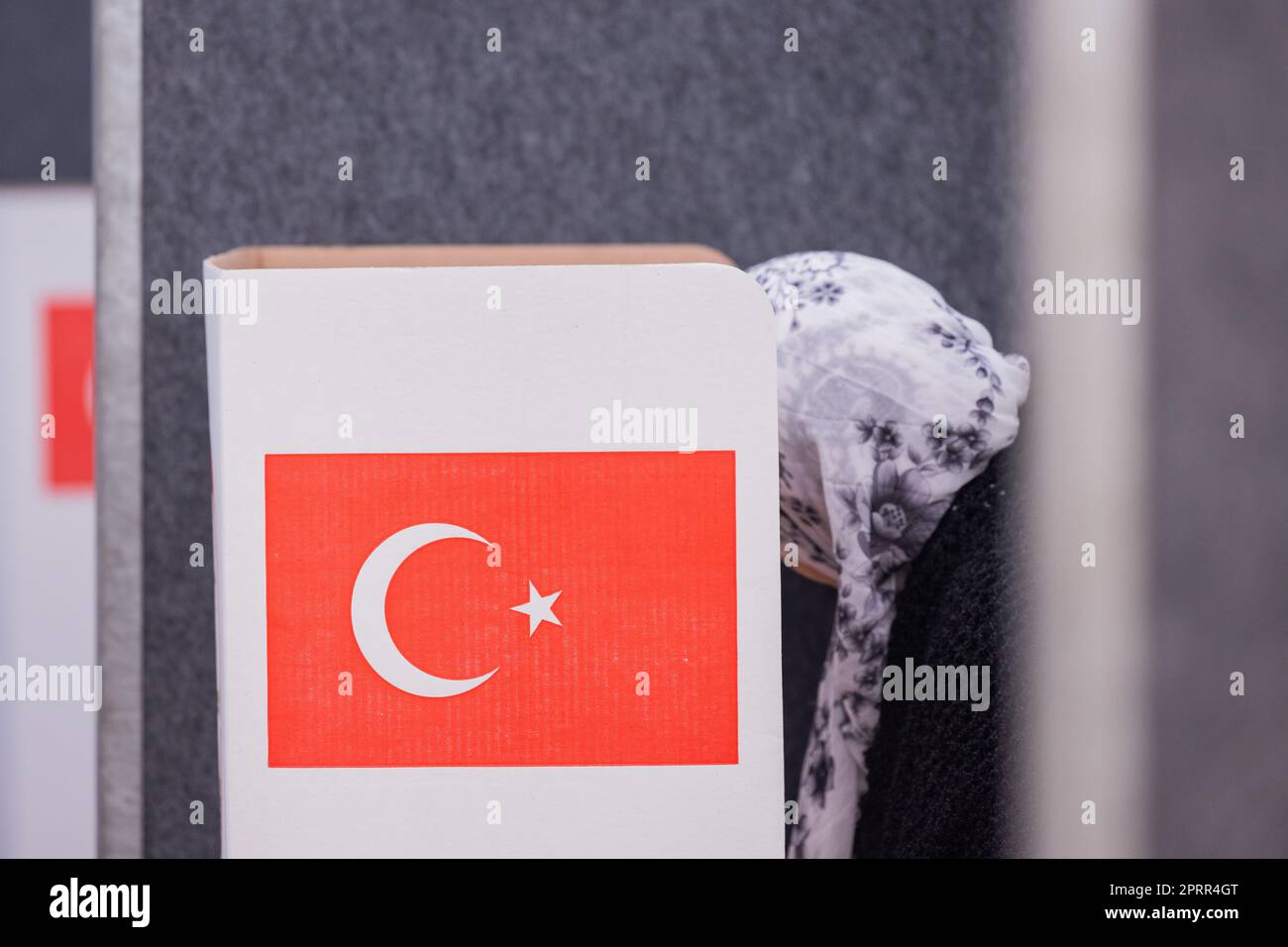 27 April 2023, North RhineWestphalia, Hürth A voter casts her vote