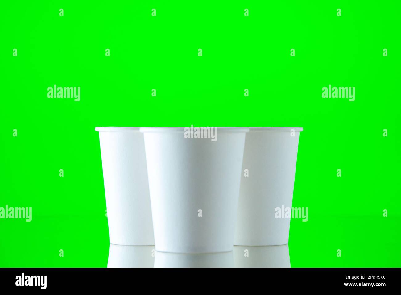 front view paper water cups on neon green background copy place Stock ...