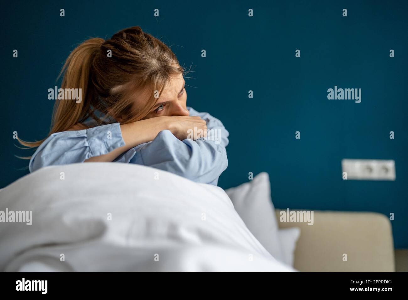 Unhappy woman having depressive mood, feeling sadness and loss of interest in everything Stock Photo