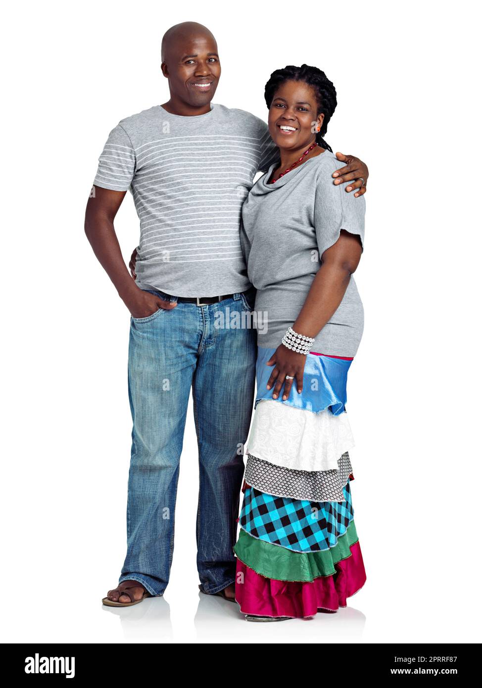 Married to my best friend. Studio shot of a happy black couple standing against a white background. Stock Photo