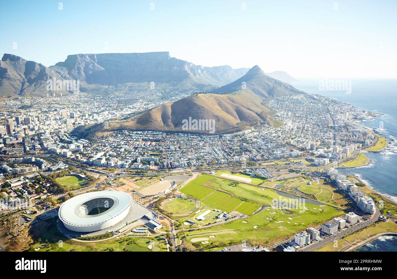 Where city meets nature. Aerial shot of Cape Town and the stadium. Stock Photo