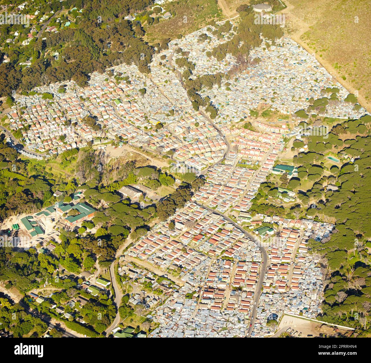 Rural development. Aerial view of a small urband development in the countryside. Stock Photo