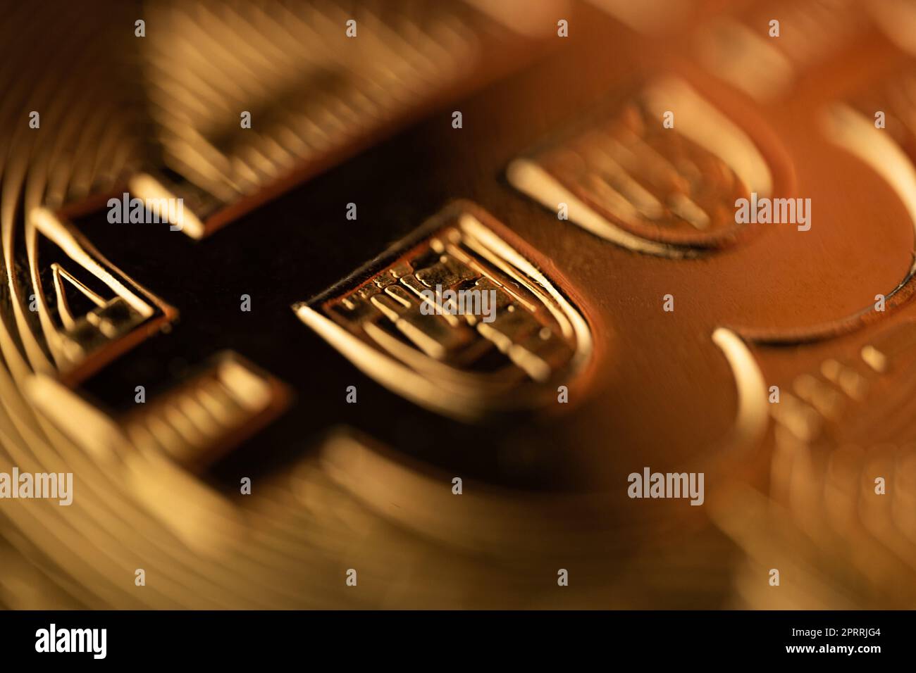 top view extreme macro closeup of crypto bitcoin golden coin logo Stock ...