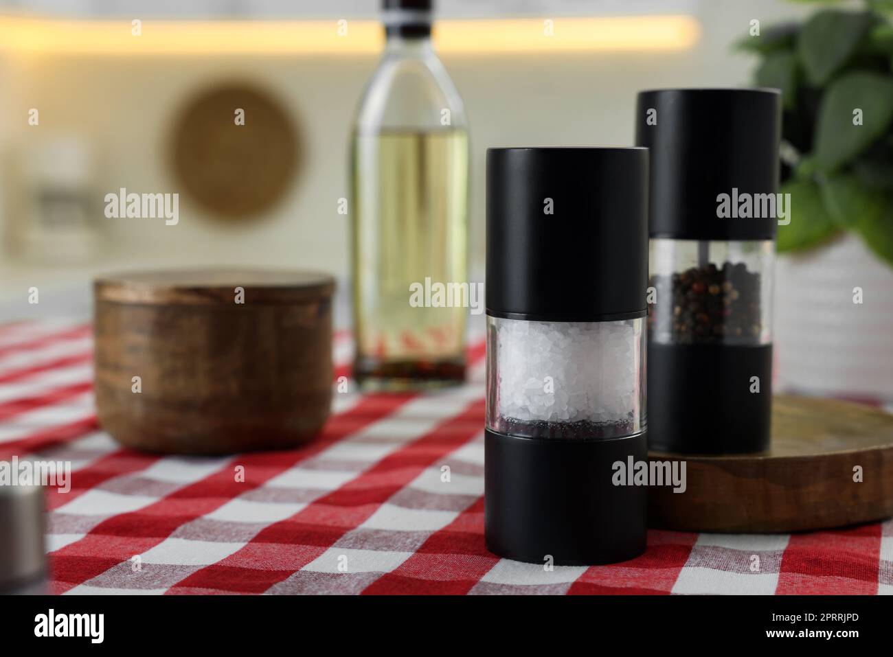 https://c8.alamy.com/comp/2PRRJPD/salt-and-pepper-shakers-on-table-indoors-space-for-text-2PRRJPD.jpg