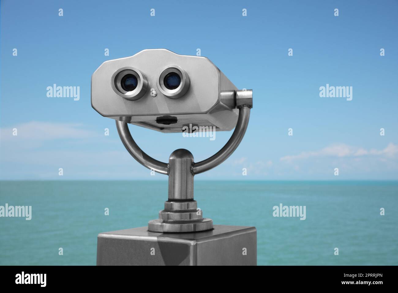 Metal tower viewer installed near sea. Mounted binoculars Stock Photo ...